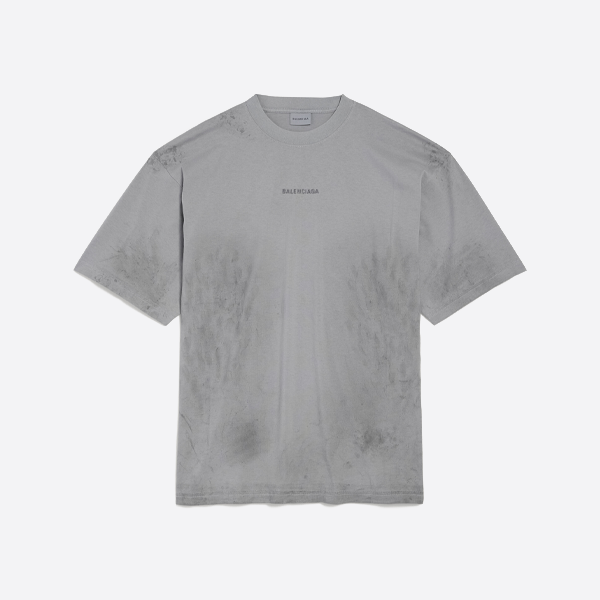 バレンシアガのロゴがグラフィティ風にプリントされたダメージ加工の半袖Tシャツ、グレー